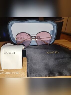 Gucci Round Sunglasses in Pink Lenses with Gold Frame